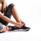 close-up-girl-tying-her-shoelaces
